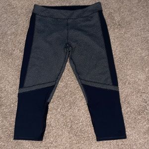 Champion brand athletic leggings. Black and grey patterned design. Size large.